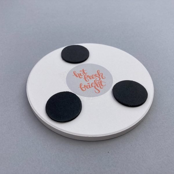 foam pads on reverse of ceramic coaster