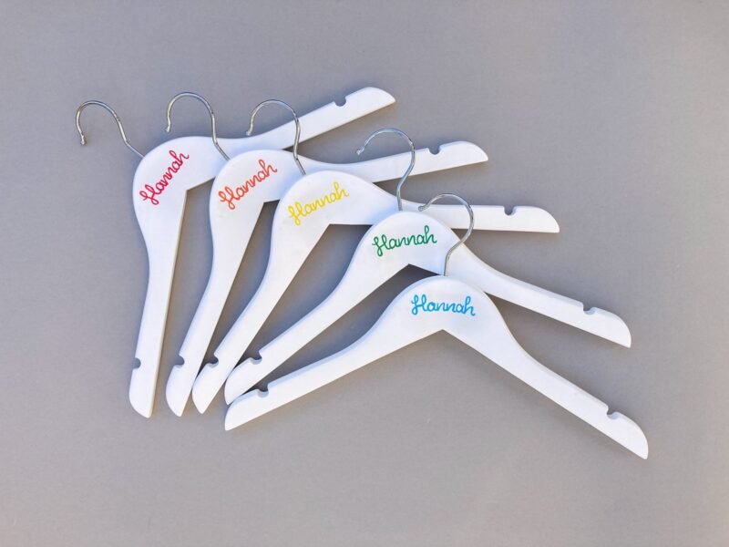 Set of rainbow name hangers with Hannah written on