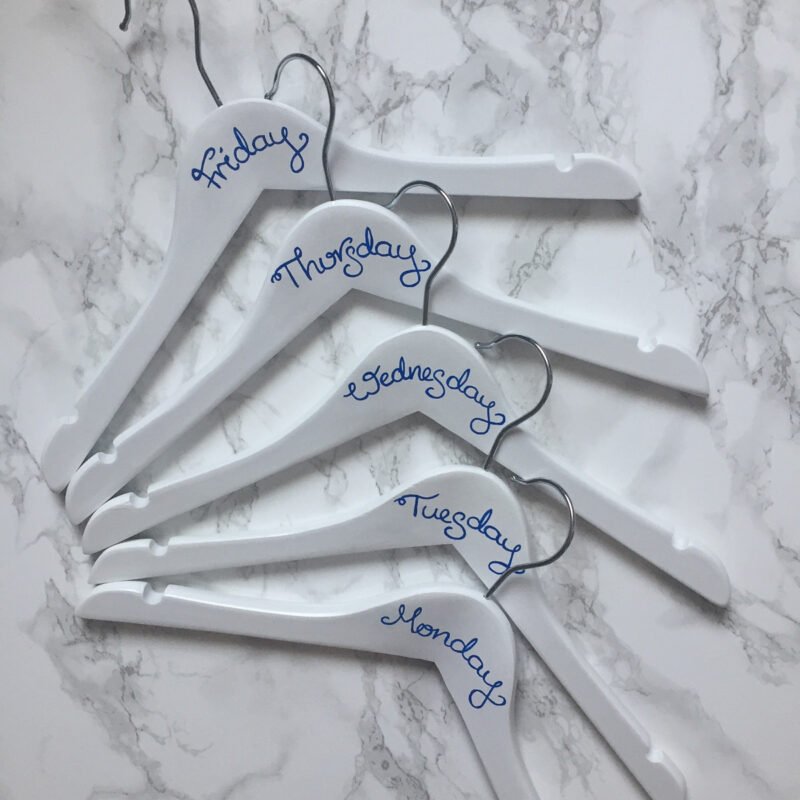 children's day of week hangers written in dark blue