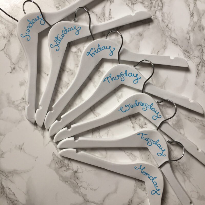 children's day of week hangers with light blue writing