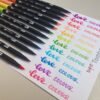 Dual ended brush pens in a rainbow of bright colours