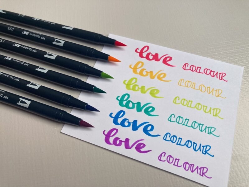 The 6 pack of pens includes red, yellow, lime green, turquoise, dark blue, and purple