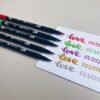 double ended brush pens in 5 Christmas colours - red, green, gold, silver, purple
