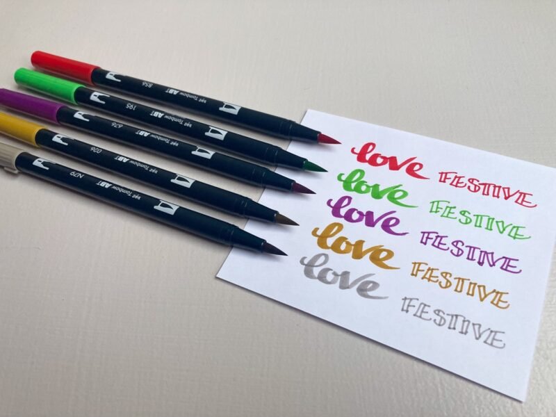 double ended brush pens in 5 Christmas colours - red, green, gold, silver, purple