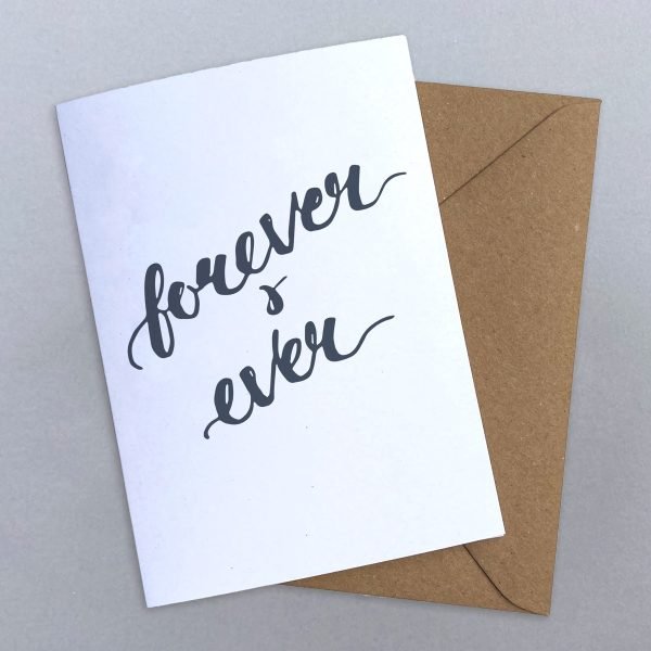 Calligraphy greetings card printed with the message forever & ever in dark grey on a white background