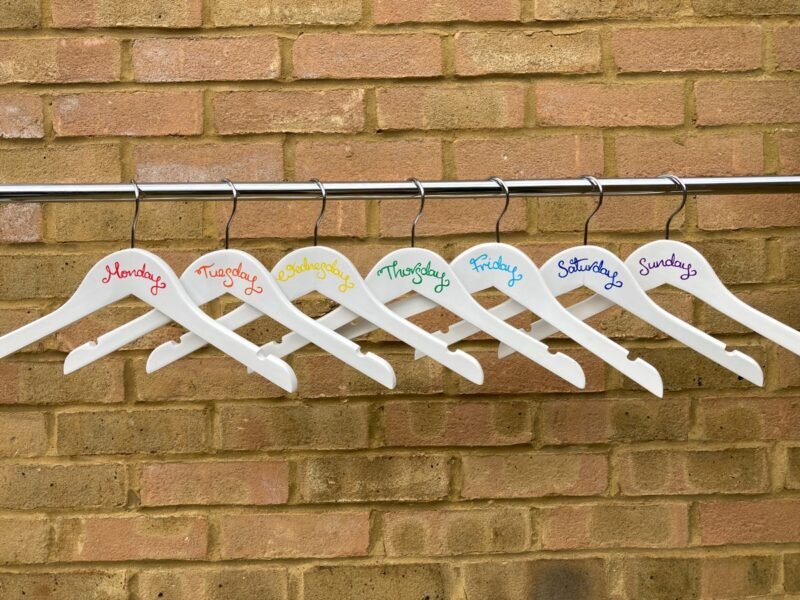 Monday to Sunday rainbow hangers on rail