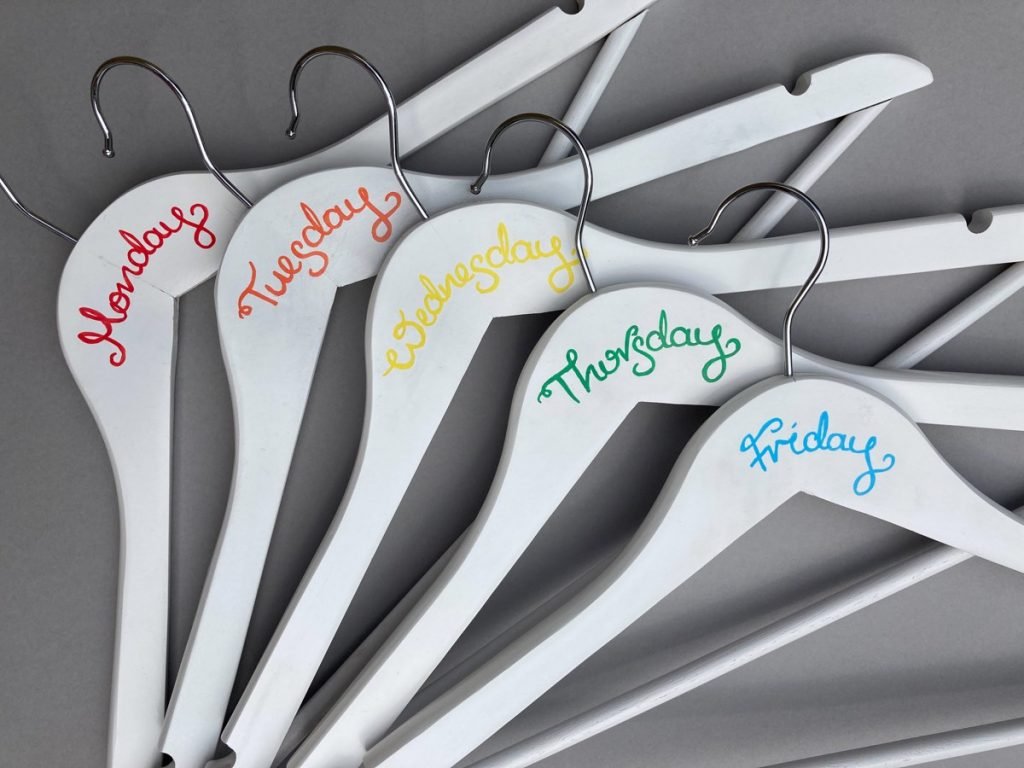 Close up view of rainbow hangers Monday to Friday