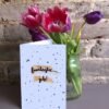 Fantastic job 5x7 card next to a vase of tulips